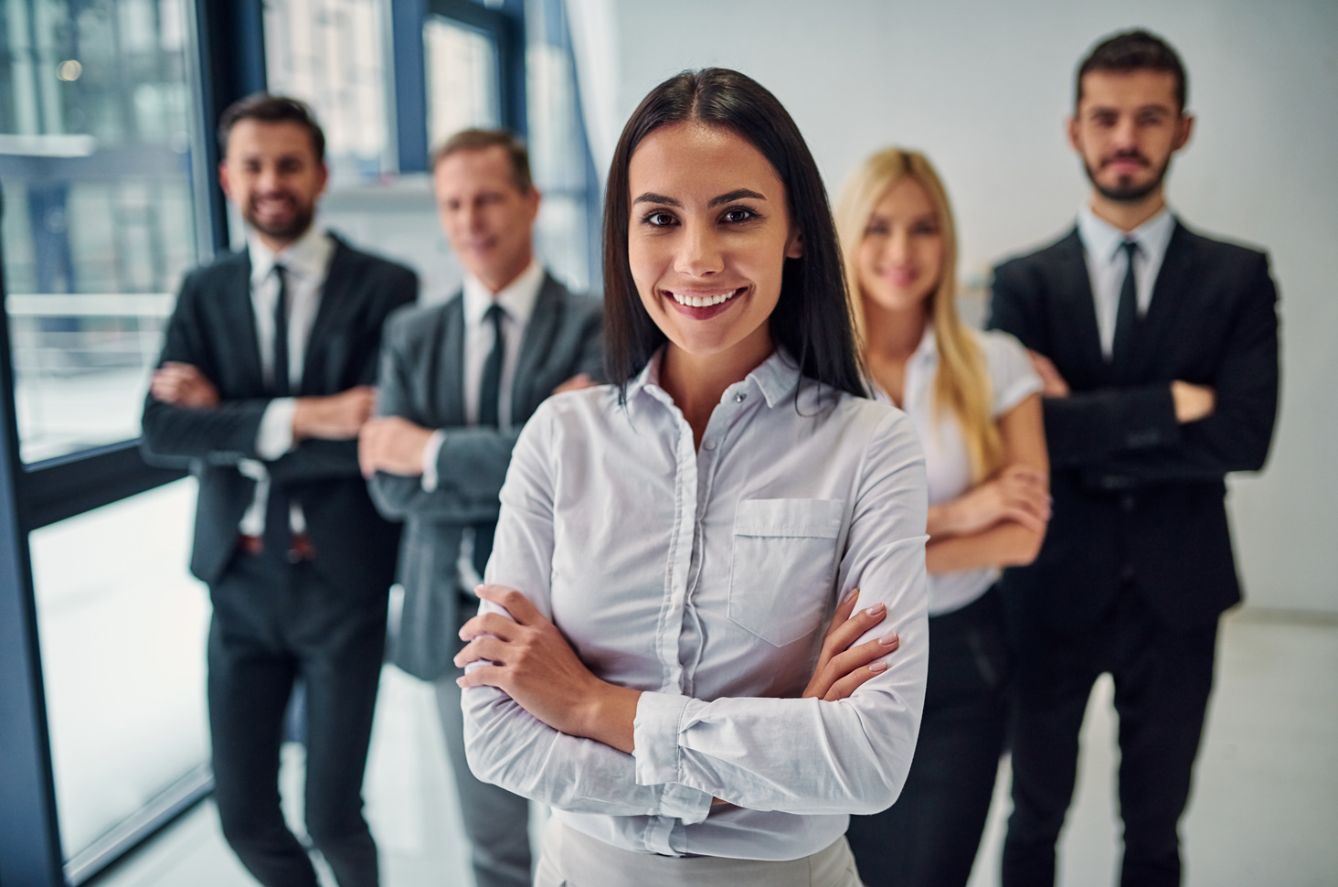 Business people working together in office. Group of office workers.